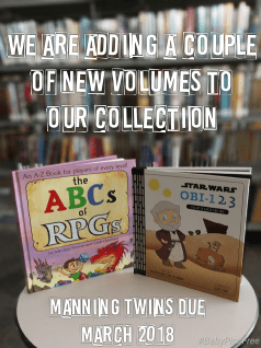 manning twins pregnancy announcement with books